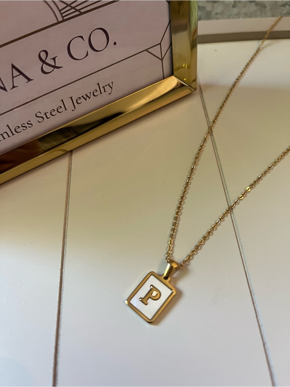 Stainless Steel Gold Initial Necklace Letter “P” with a white inlay.